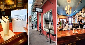 a tall cocktail glass, filled with a Ramos Gin Fizz, at Bar Tonique in New Orleans; red brick wall and white lattice windows, wooden bar